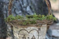 a bark, vine and moss flower girl basket is a cool idea for a rustic or woodland wedding