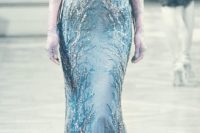 a breathtaking embellished blue sheath wedding dress with an illusion neckline for a Frozen-themed bridla look