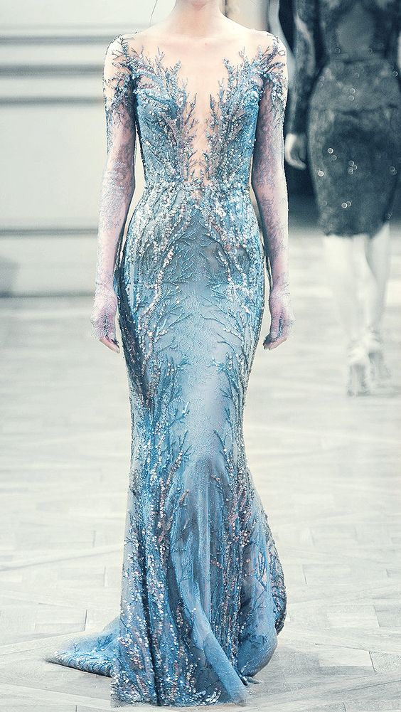 a breathtaking embellished blue sheath wedding dress with an illusion neckline for a Frozen-themed bridla look