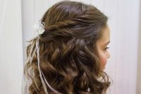 a lovely half updo with curls down, a twisted halow and a small bow headpiece is a pretty idea that will work for any style