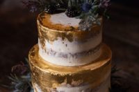 a naked wedding cake with gold leaf, blackberries, greenery, thistles is a decadent idea for a fall wedding