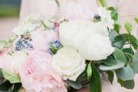 an exquisite wedding bouquet of white and rose quartz peonies, lavender, astilbe and greenery is a gorgeous idea