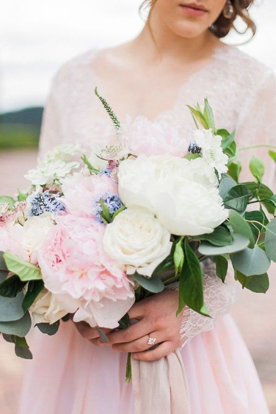 an exquisite wedding bouquet of white and rose quartz peonies, lavender, astilbe and greenery is a gorgeous idea