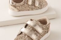 gold glitter sneakers are a nice option for a glam flower girl and for a more casual wedding