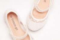 heavenly white lace flats with pearl straps are classics that will fit a formal flower girl look