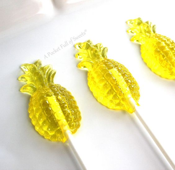 pineapple shaped mini lollipops are amazing for tropical weddings, they are bright and cool