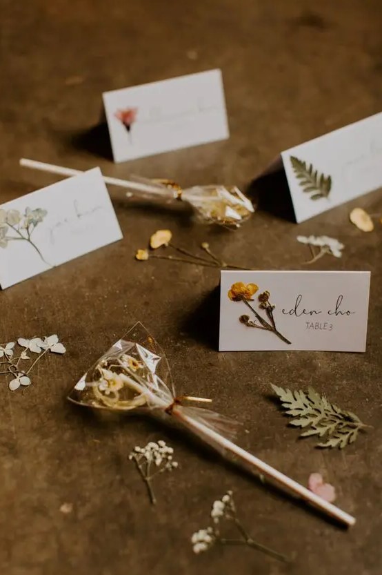 pressed flower lollipops are amazing as wedding favors or as a dessert on the dessert table, perfect for a boho wedding