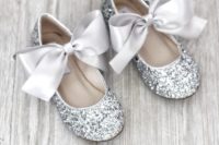 silver glitter flats with large silk bows are a nice idea for a flower girl