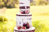 a fall chocolate naked wedding cake with cherries, pears and figs is a nice idea for a fall wedding
