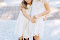 white crochet lace knee dresses with high necklines, cap sleeves and cowboy boots look cool
