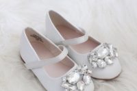 white flat shes with heavy embellishments are a great idea for a flower girl