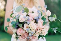 a lovely pastel blue pink wedding bouquet