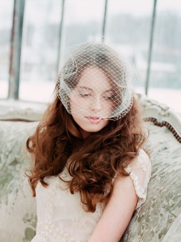 a pleated mini birdcage veil is a fresh and pretty take on a traditional birdcage piece