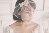 a mini pleat birdcage veil with lovely gold lace appliques is a refined and beautiful wedding headpiece to rock