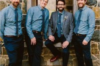 a very relaxed groom’s look with navy pants, a chambray shirt, a blue tie, a grey blazer and brown shoes