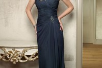 an elegant and formal deep teal maxi dress with a draped bodice and an embellishments plus a V-neckline