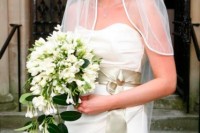 a chic and lovely white freesia wedding bouquet with a cascading element is a lovely idea for a modern wedding