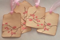 cherry blossom tags can personalize your wedding favors or can be hung on the centerpieces to make the table number
