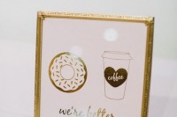a cute wedding sign in pink and gold with a coffee cup and a donut is a fun decoration for a relaxed wedding