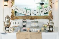 a refined vintage coffee bar with a refined mirror, silver tanks, galvanized stands and bowls for a rustic feel