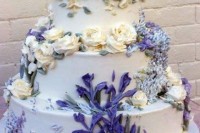 a cute wedding cake design with irises