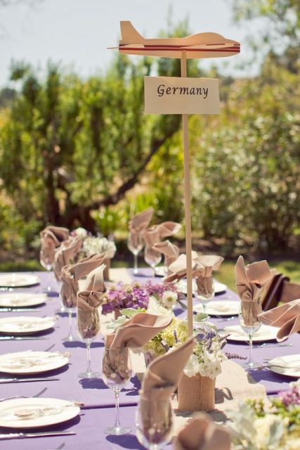 a table named Germany with a plane - it's a cool idea to mark each table and name it after coutries where you've been