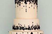 a catchy black and white wedding cake with views of London for a travel-loving couple or for those who are getting married in London