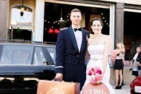 thank your guests with pretty suitcases to mark that this is a travel-themed wedding