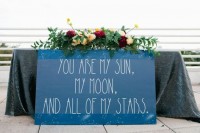 a large romantic sign that marks the sweetheart table at your celestial or astronomy wedding