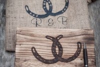 a wooden box for wedding cards with horseshoes and a matching burlap bag to put it inside