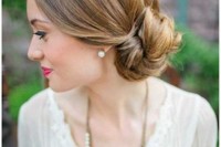a low side bun with a sleek top is a stylish idea that fits most of bridal styles and looks