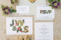 a cool floral wedding invitation suite with a neutral envelope, floral linine and letters is a very cool and bold idea