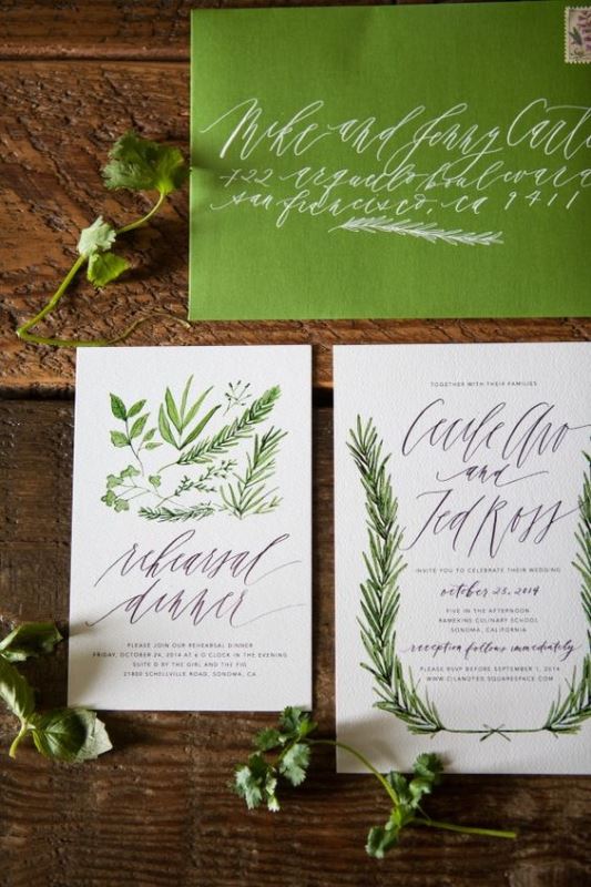 a green and white wedding invitation suite with greenery prints and calligraphy is a chic idea for a spring wedding