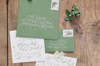 a stylish green and white wedding invitation suite with subtle green botanical prints is a gorgeous idea