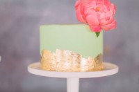 a gentle green cake with some gold