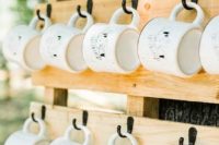a coffee mug station  – personalize each mug to give them as wedding favors that are budget-friendly