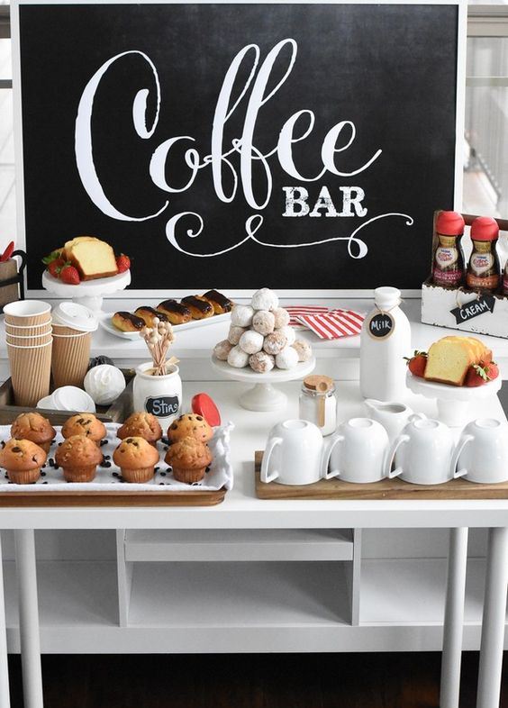 a cozy coffee bar with a large chalkboard sign, sweets, mugs, milk in bottles and cute cups is all you need to cozy up your reception