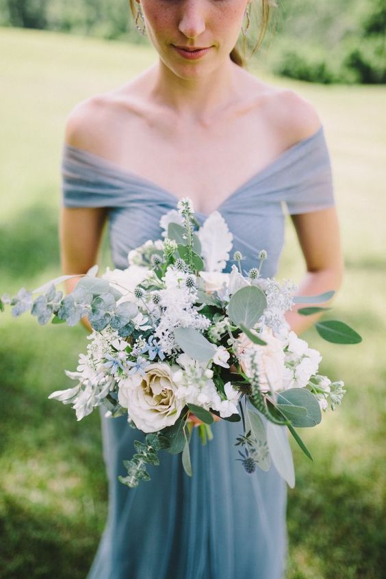 a dreamy wedding bouquet of white and serenity blue blooms,eucalyptus and greenery is a chic idea for a spring wedding