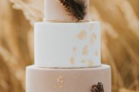a lovely blush and white wedding cake with rope, feathers and gold leaf is stylish and very romantic