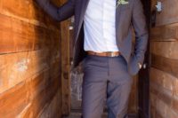 a modern barn groom’s look with a chocolate brown suit, a white button down, creamy shoes and amber touches