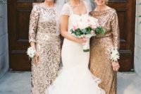 a neutral lace fitting maxi dress with a high neckline and long sleeves plus a sash for a chic look