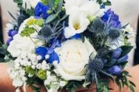 a pretty and bold wedding bouquet of white blooms, blue irises, thistles and some greenery and baby’s breath is amazing