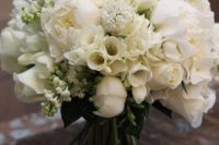 a white wedding bouquet composed of roses, peonies and freesias is a lovely idea for a neutral wedding