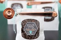 cute wedding guest favors – coffee beans in packages with copper spoons are stylish and cool