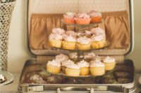 offer wedding desserts and sweets in a vintage suitcase to match your wedding theme