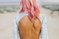 pink hair with peachy and gold balayage, with much texture and a silver sequin dress for a wow look at the wedding