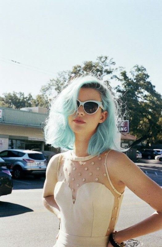 short and textural blue hair with a volume gives the bride that cool badass look effortlessly