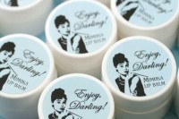 mimosa lip balm packed in tins with cool themed stickers on top as gifts for your gals