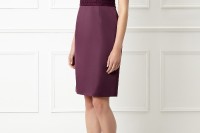 a plum-colored knee sheath dress with a lace bodice, short sleeves and a plain skirt plus silver shoes to enliven the ensemble
