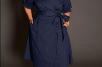a navy wrap draped dress with lapels, pockets, colorful shoes and a necklace for a more casual wedding